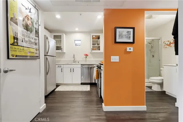 a bathroom with a sink toilet and vanity