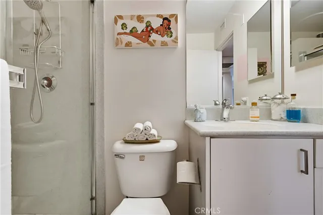 a view of balcony with a potted plant and outdoor seating