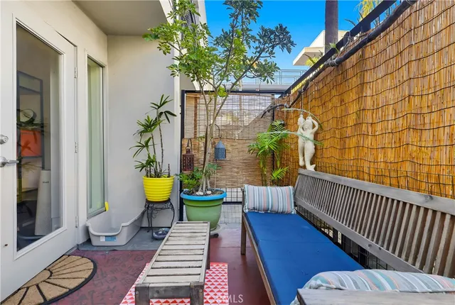 a view of a car parked in front of a building