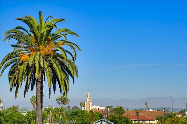 a view of a chairs and table in a terrace