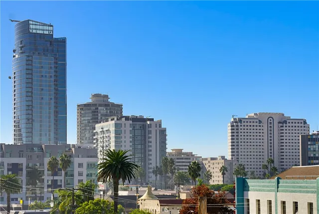 a view of buildings from the balcony