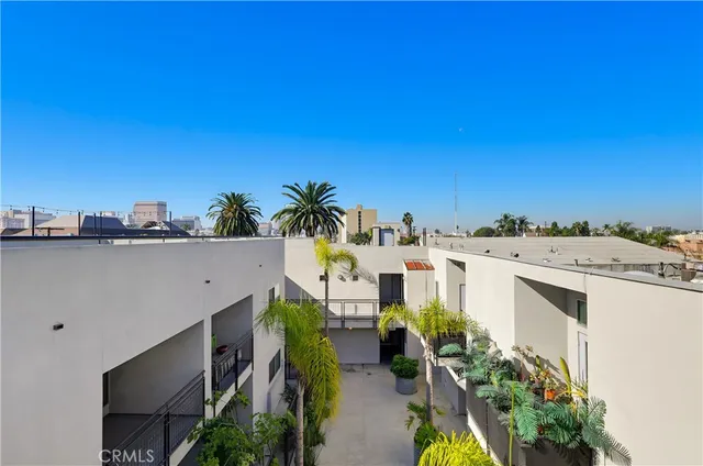 a view of a city with tall buildings in the background