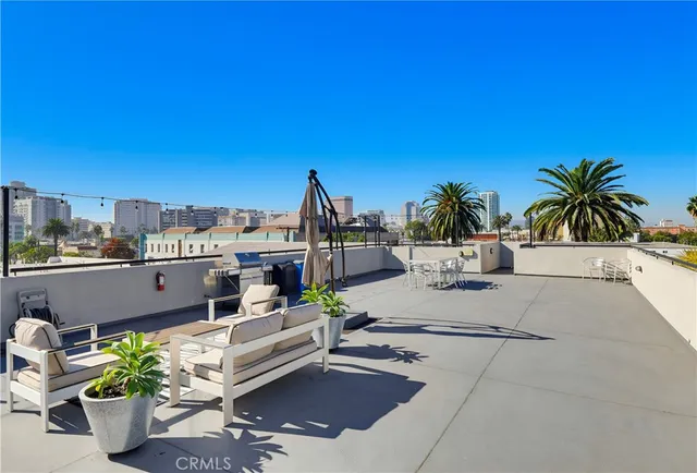a room with pool table and windows
