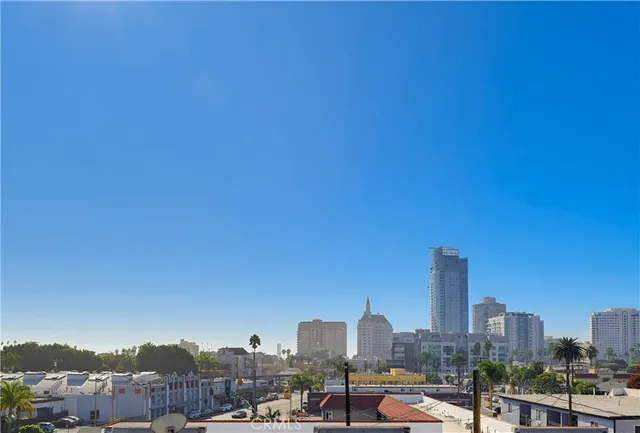 a view of parking garage with cars