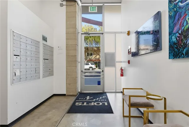 a view of parking garage with cars