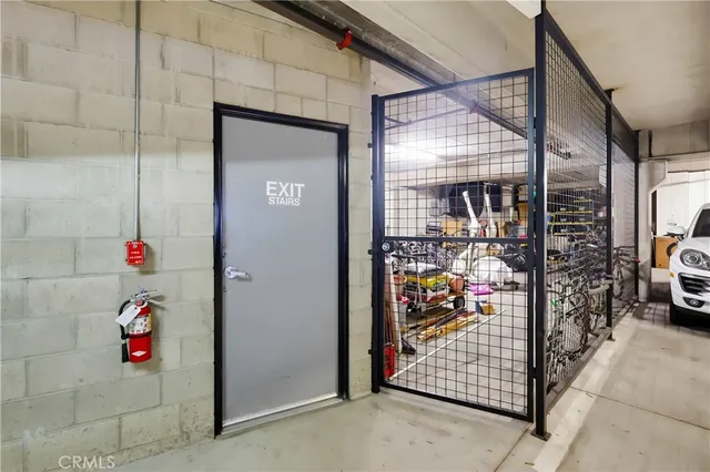 a view of a terrace with furniture and outdoor kitchen