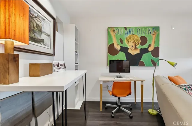 a kitchen with cabinets stainless steel appliances and a sink