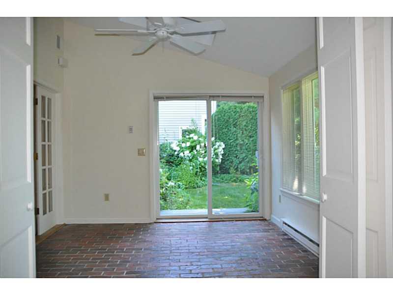 20 Foreside Common Road, Unit 20 Falmouth, ME 04105 - Photo 14 of 22 Sunroom.