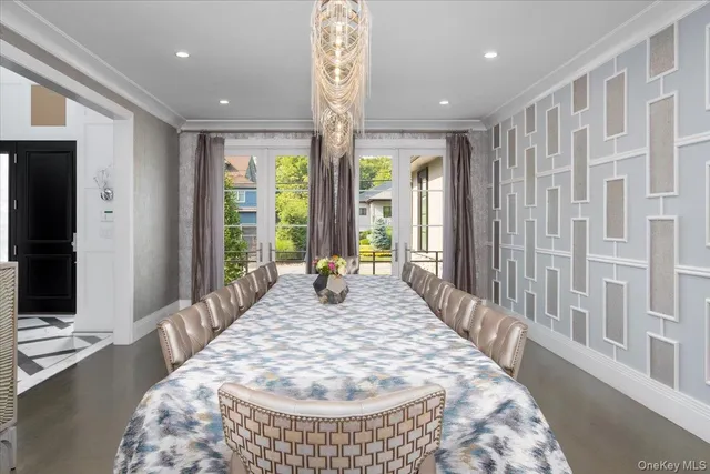 a bed sitting in a spacious bedroom next to a window