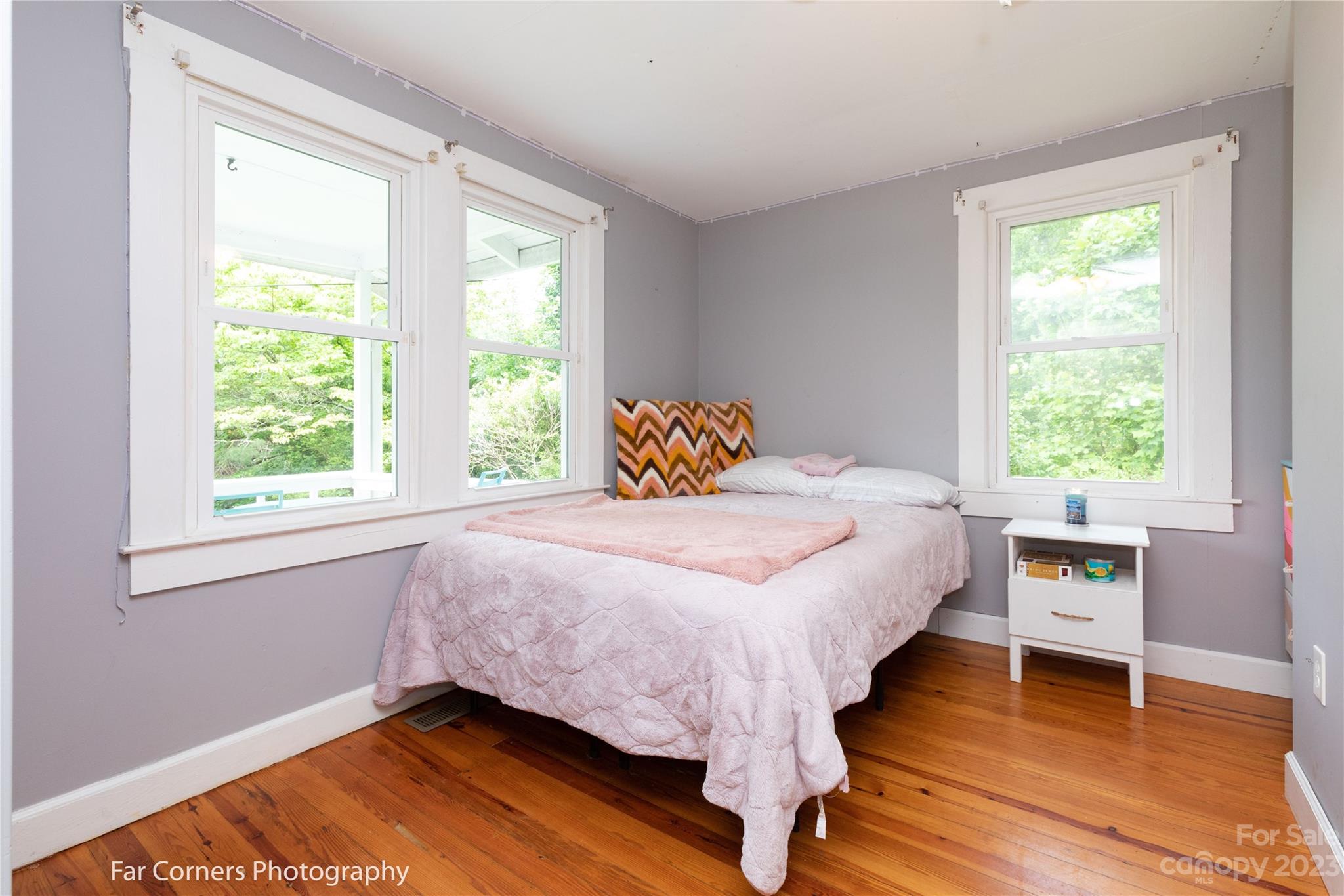1335 Upper Brush Creek Road Fairview, NC 28730 - Photo 13 of 24 a bedroom with a bed and a window