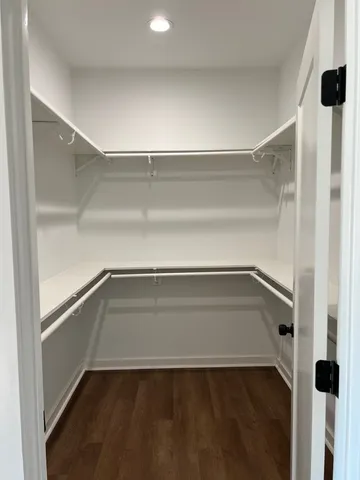 a view of an empty walk in closet