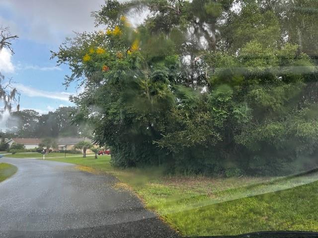 0 Silver Course Loop Ocala, FL 34472 - Photo 1 of 6 a view of a golf course with a lake