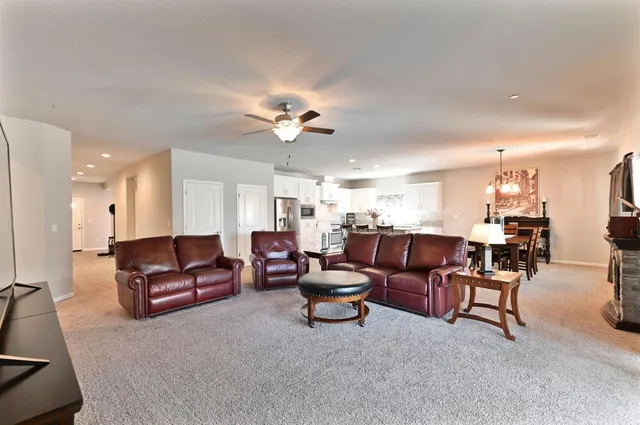 a bedroom with a bed and a television