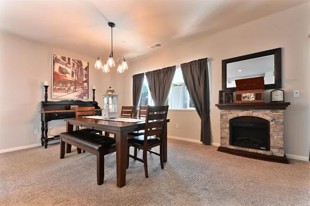 a view of walk in closet with clothes