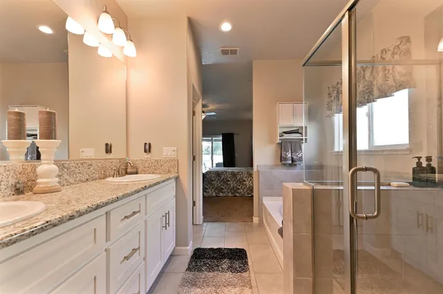 a view of cabinets with washer and dryer