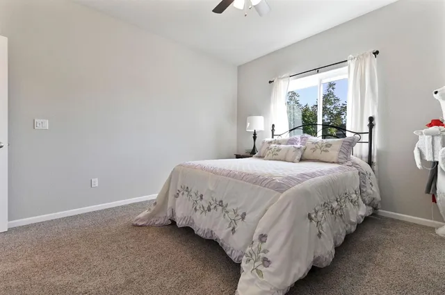 a utility room with sink dryer and washer