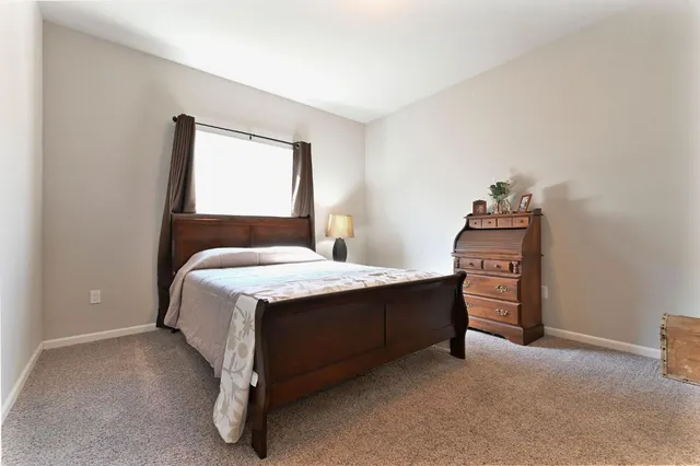 a view of a lake with a yard