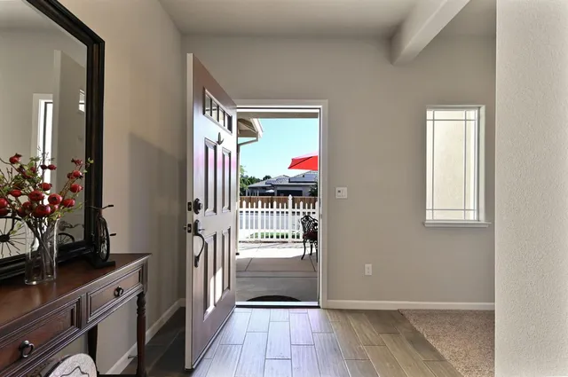 a kitchen with stainless steel appliances granite countertop a stove a microwave and cabinets