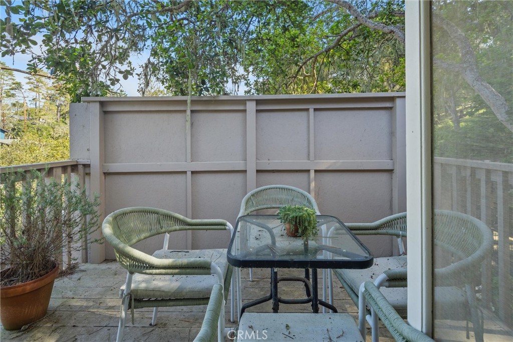 1361 Haddon Drive Cambria, CA 93428 - Photo 13 of 22 a balcony with table and chairs
