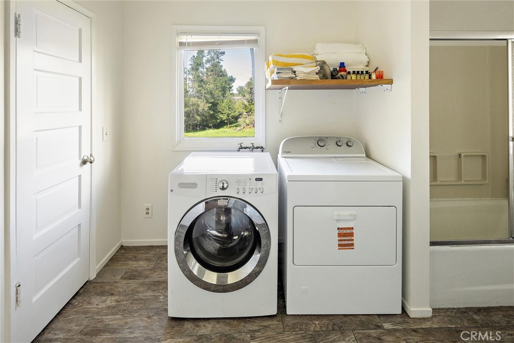 1361 Haddon Drive Cambria, CA 93428 - Photo 21 of 22 a utility room with dryer and washer