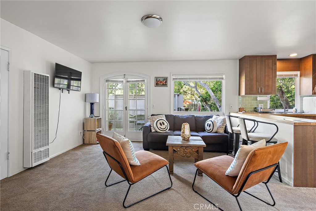 1361 Haddon Drive Cambria, CA 93428 - Photo 5 of 22 a living room with furniture and a large window