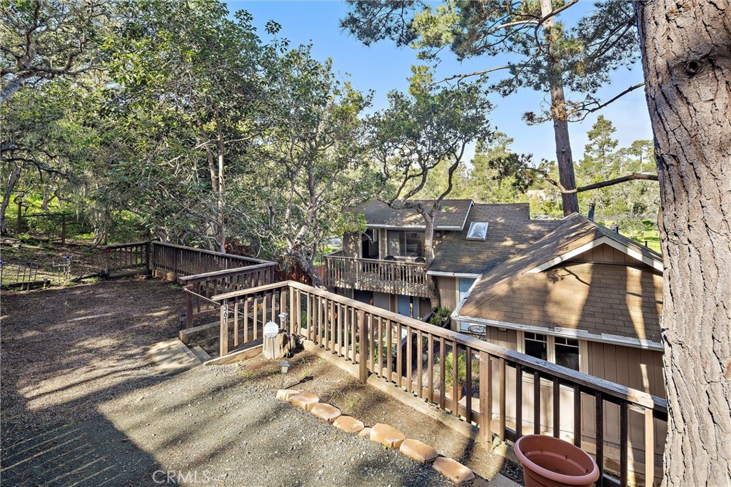 1361 Haddon Drive Cambria, CA 93428 - Photo 5 of 23 a view of a balcony with two plants
