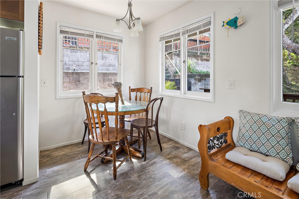 1361 Haddon Drive Cambria, CA 93428 - Photo 9 of 22 a view of a dining room with furniture window and outside view