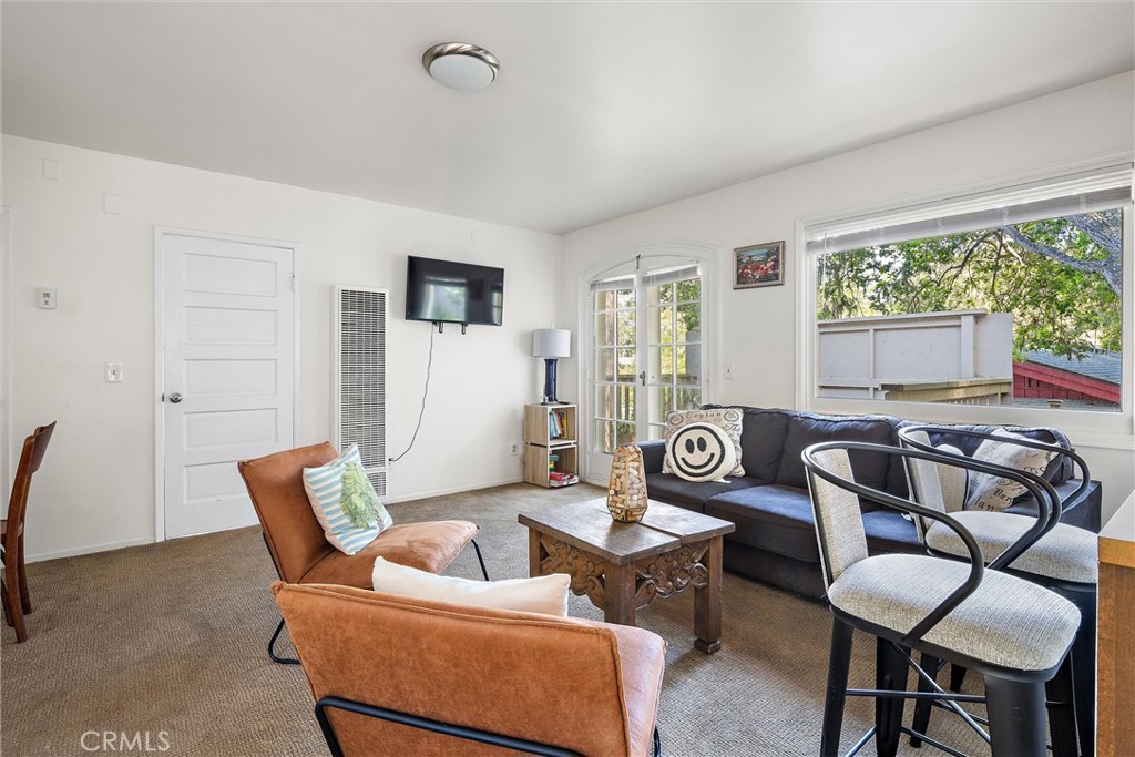 1361 Haddon Drive Cambria, CA 93428 - Photo 10 of 23 a living room with furniture and a large window