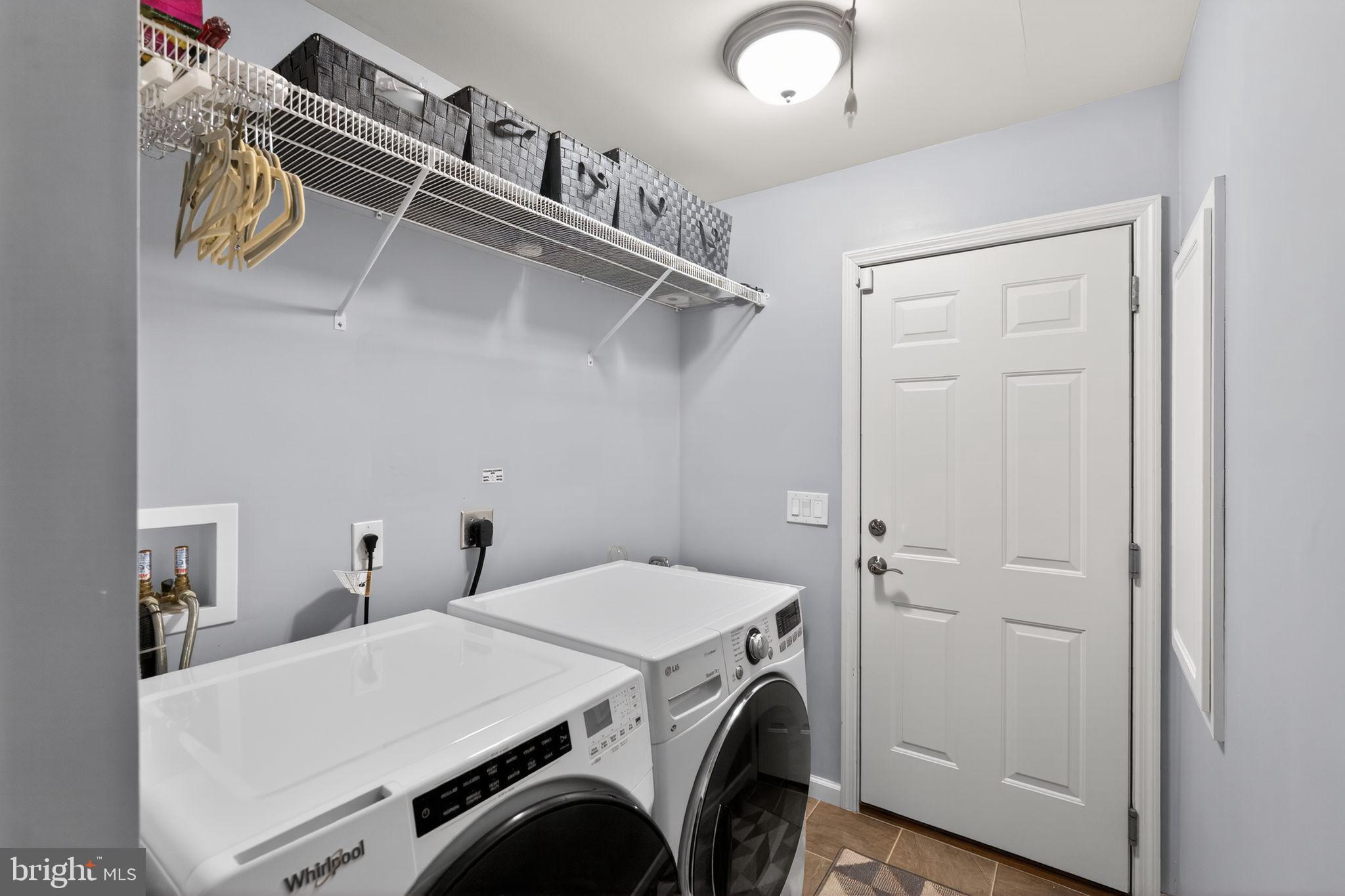 411 Honeysuckle Lane Blue Bell, PA 19422 - Photo 23 of 26 a utility room with dryer and washer