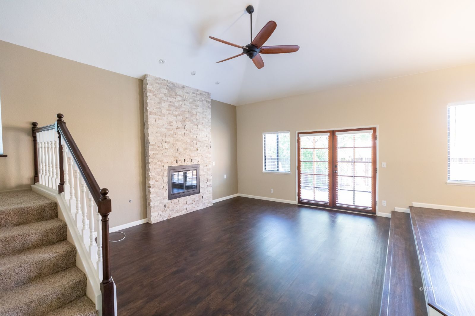 418 Tepatitlan Court Ridgecrest, CA 93555 - Photo 6 of 40 a view of an empty room with wooden floor and a window