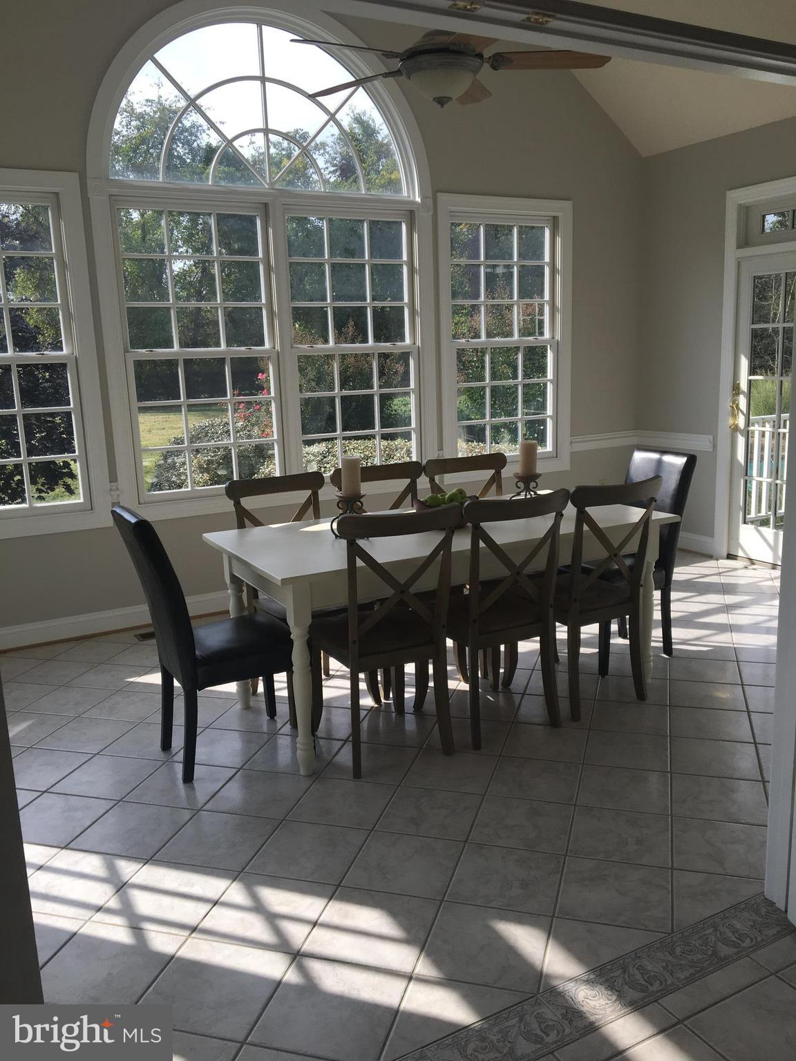 20393 Cockerill Road Purcellville, VA 20132 - Photo 12 of 29 Breakfast room w/tile floor and walls of windows