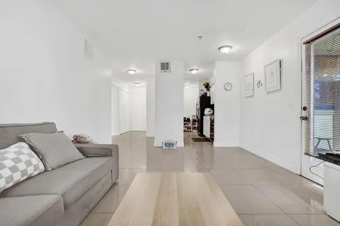 a living room with furniture and a couch