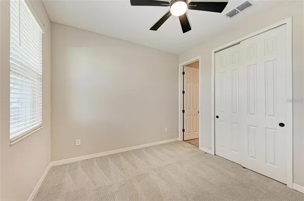 a view of an empty room and window