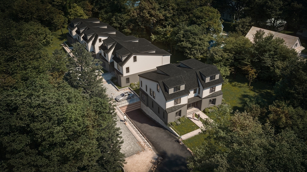 an aerial view of a house with a yard swimming pool and outdoor seating