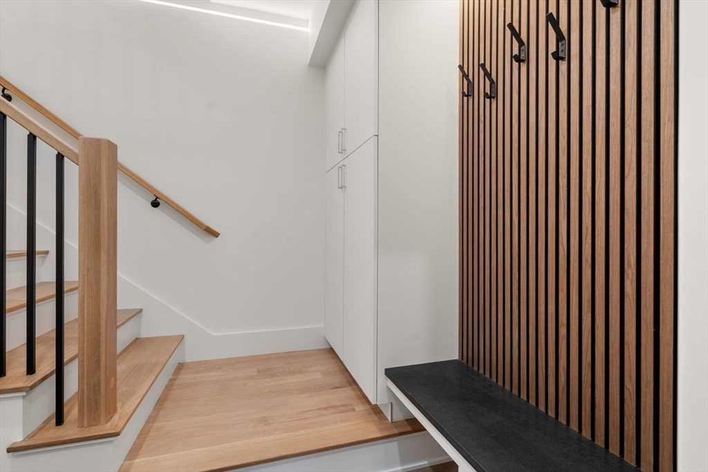 956 Walnut Street, Unit 7 Newton, MA 02459 - Photo 24 of 32 a view of entryway with wooden floor