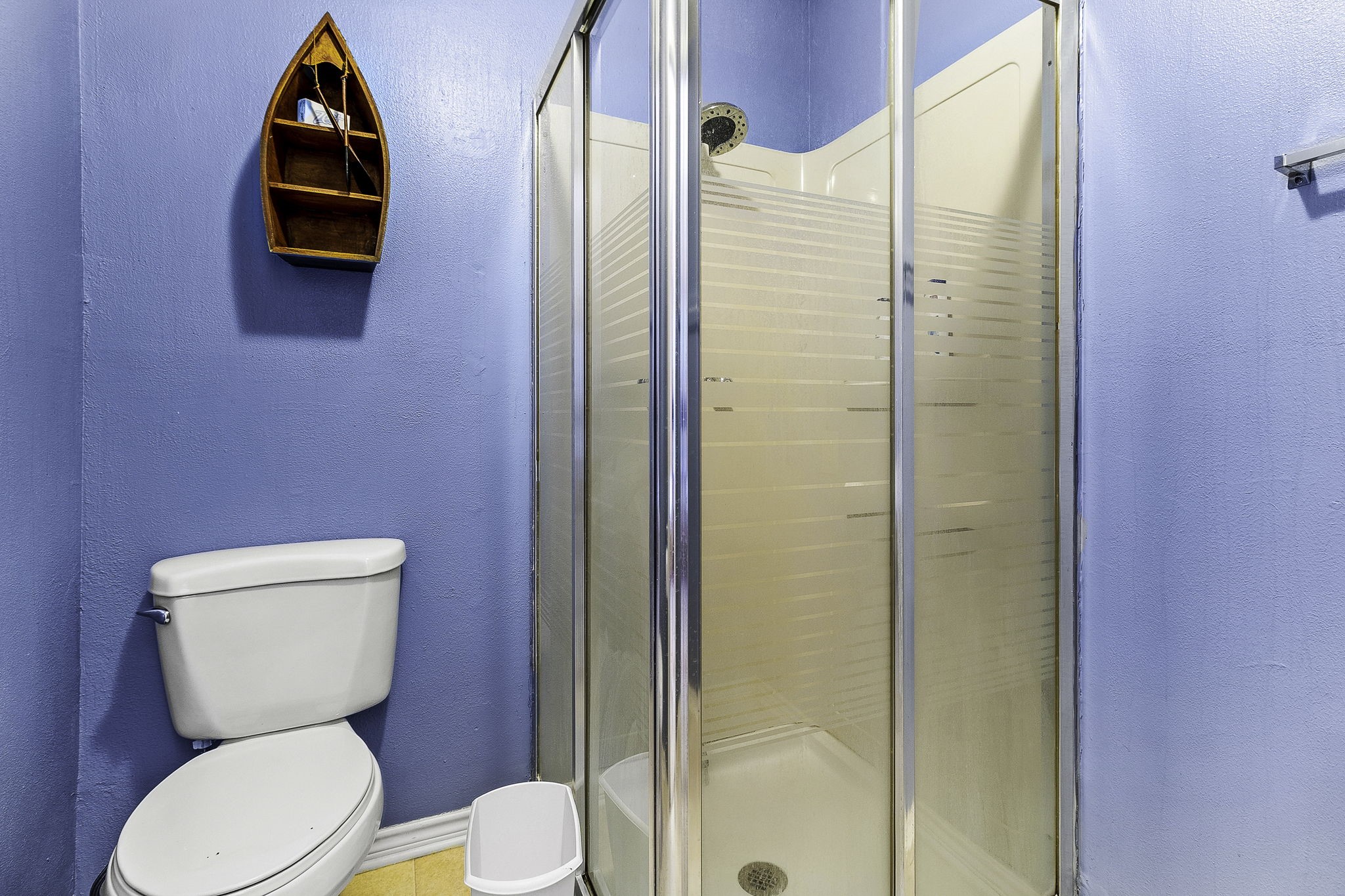 536 Weavers Cove Road Livingston, TX 77351 - Photo 23 of 44 a bathroom with a toilet and a glass door
