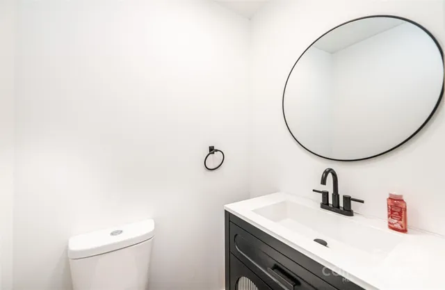 a view of livingroom with furniture wooden floor and windows