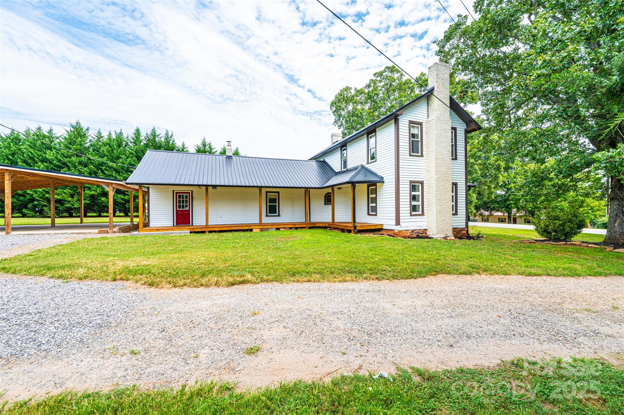 4645 Rifle Range Road Conover, NC 28613 - Photo 29 of 36 a front view of a house with a yard