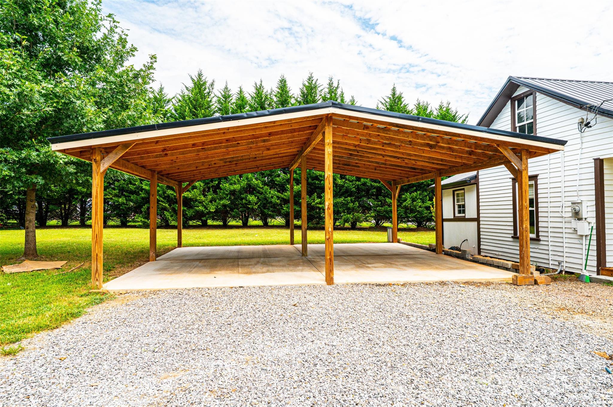 4645 Rifle Range Road Conover, NC 28613 - Photo 31 of 36 a view of a house with backyard and chairs
