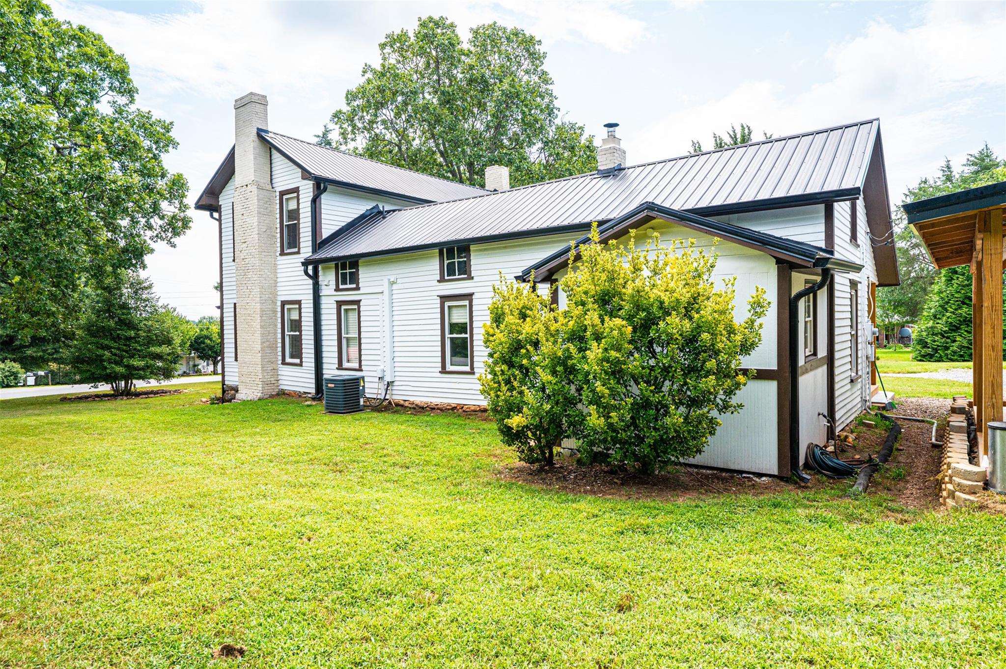 4645 Rifle Range Road Conover, NC 28613 - Photo 34 of 36 a view of a house with backyard and garden