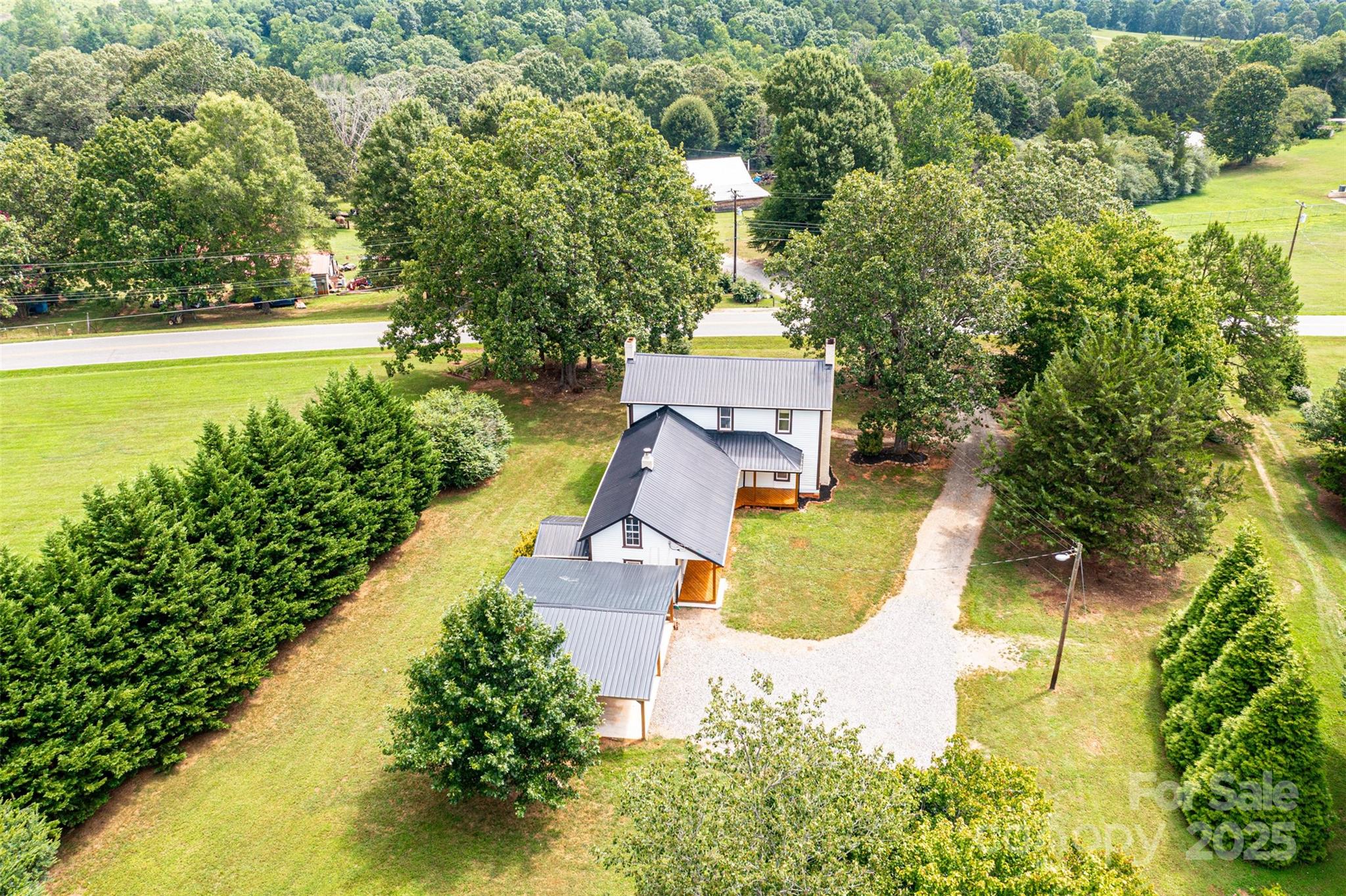 4645 Rifle Range Road Conover, NC 28613 - Photo 5 of 36 a view of a swimming pool with a yard