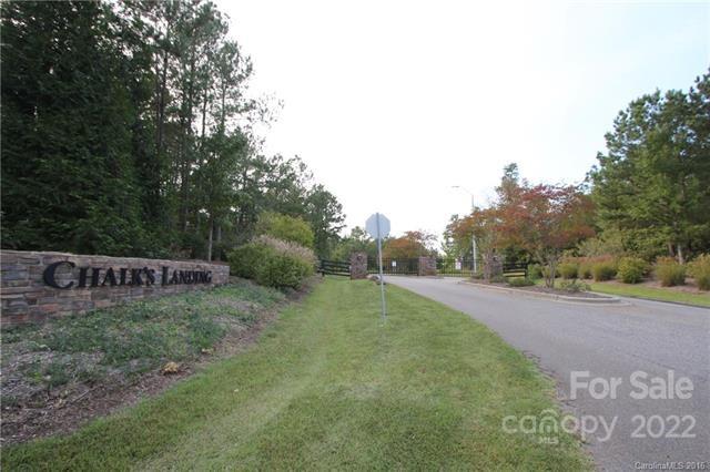 189 Vista Lane, Unit 189 Rockingham, NC 28379 - Photo 2 of 10 a view of a field with trees in the background