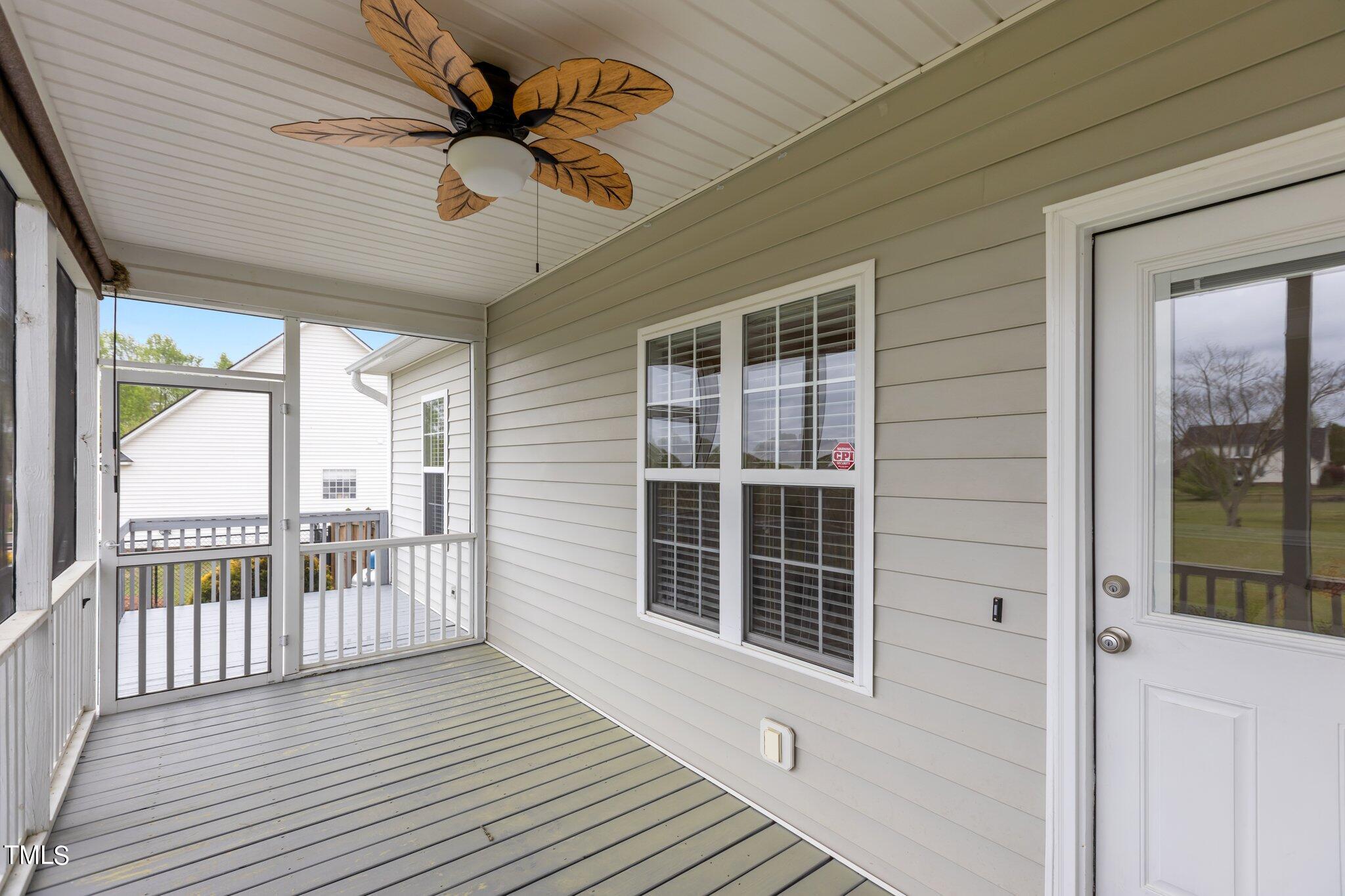 148 Ina Joe Place Willow Spring, NC 27592 - Photo 34 of 41 a view of a balcony with wooden floor