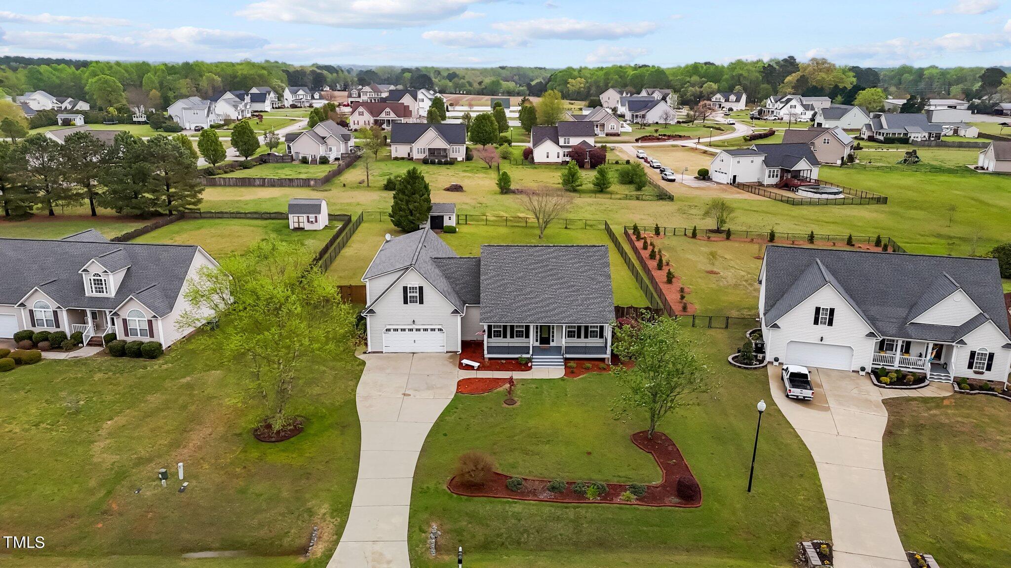 148 Ina Joe Place Willow Spring, NC 27592 - Photo 40 of 41 an aerial view of residential houses with outdoor space