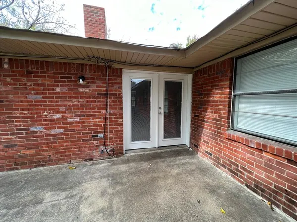 a front view of a house with a garage