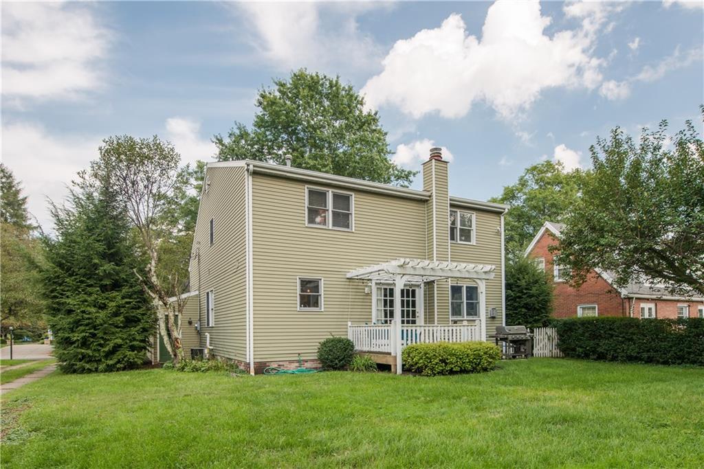405 Oliver Road Sewickley, PA 15143 - Photo 2 of 25 Large level backyard with deck is the perfect place for enjoying the outdoors.