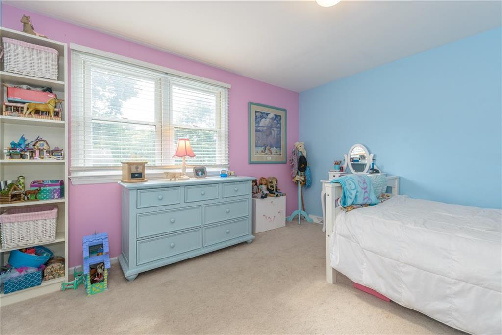 405 Oliver Road Sewickley, PA 15143 - Photo 17 of 25 Fourth bedroom also has nice windows and lots of space for family or guests.