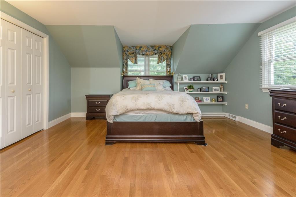 405 Oliver Road Sewickley, PA 15143 - Photo 19 of 25 Master bedroom has wood floors and is very spacious with a large open closet for lots of clothes storage.