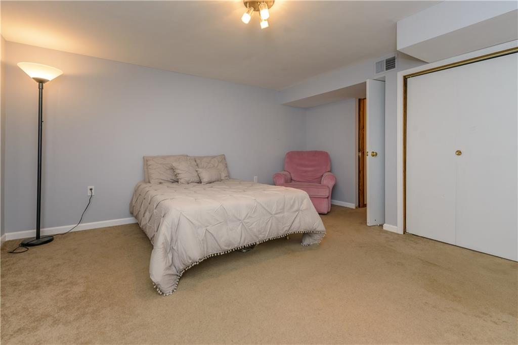 405 Oliver Road Sewickley, PA 15143 - Photo 21 of 25 Guest suite in lower level offers perfect space for guests with large closet.