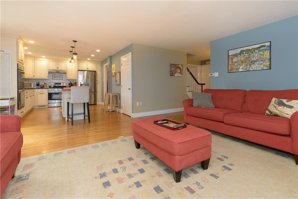 405 Oliver Road Sewickley, PA 15143 - Photo 6 of 25 Warm wood floors and open sightlines on main level.